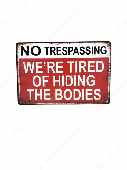 No trespassing - we re tired of hiding the bodies - Metal Wall Sign